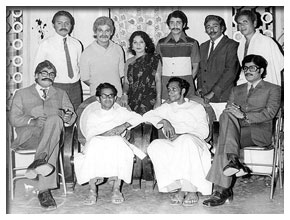As a play writer with actors in his drama Sethubhangam